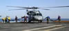 Refueling a helo onboard USS DULUTH during OPERATION IRAQI FREEDOM