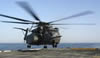 Helo lands onboard USS DULUTH